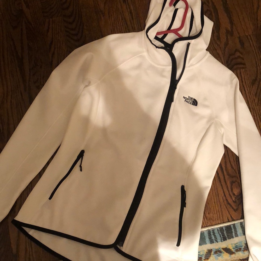 White and black north face zip up